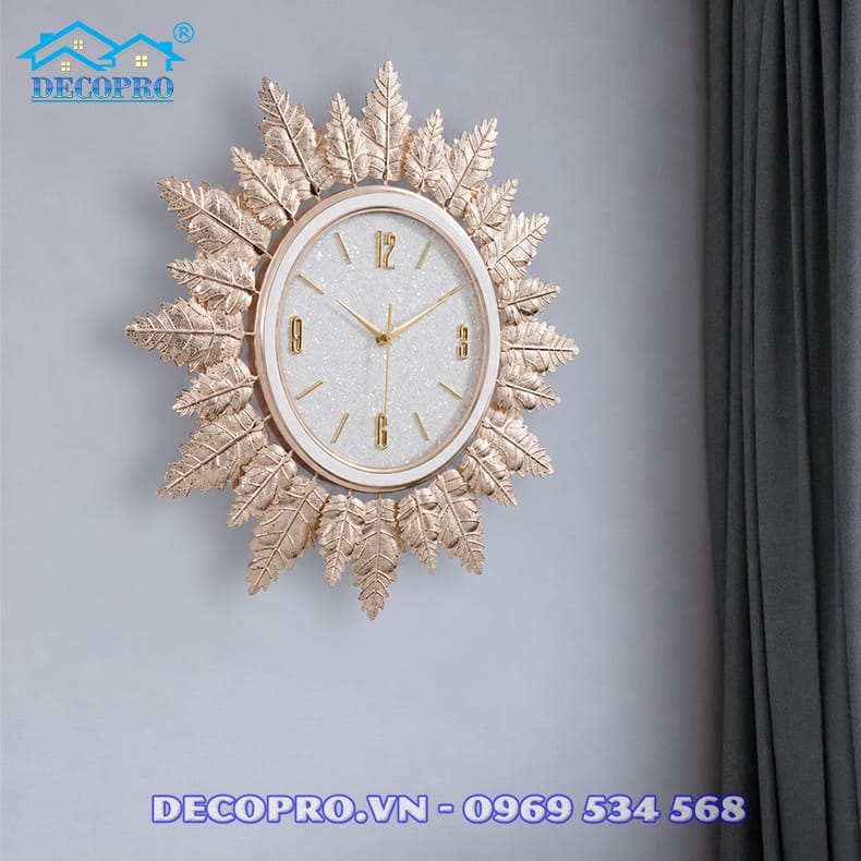 Đồng hồ treo tường lá vàng Decopro – món quà ý nghĩa cho tổ ấm mới.
