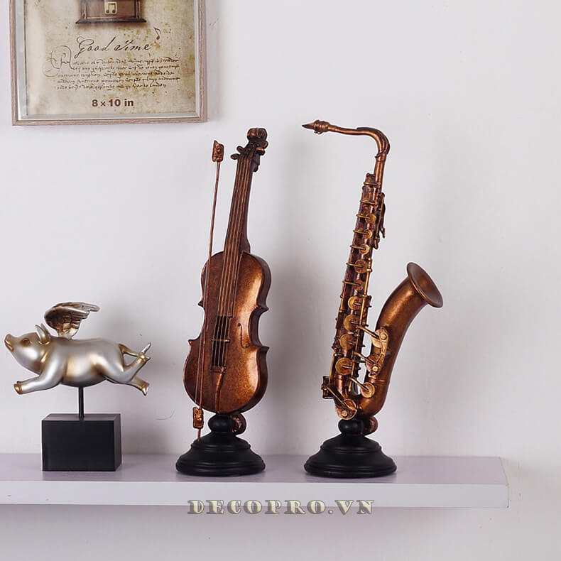 Bộ đồ decor trang trí kèn Saxophone – đàn violin có khả năng nuôi dưỡng tình yêu âm nhạc cho trẻ nhỏ