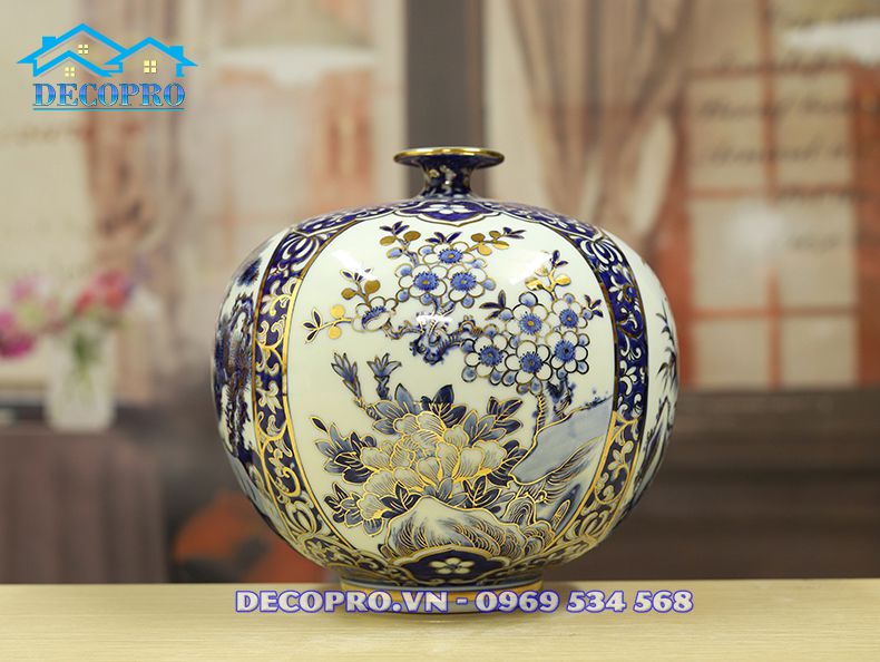 Quà tặng sếp mệnh Thủy bình hút tài lộc vuốt tay vẽ vàng Tứ Cảnh